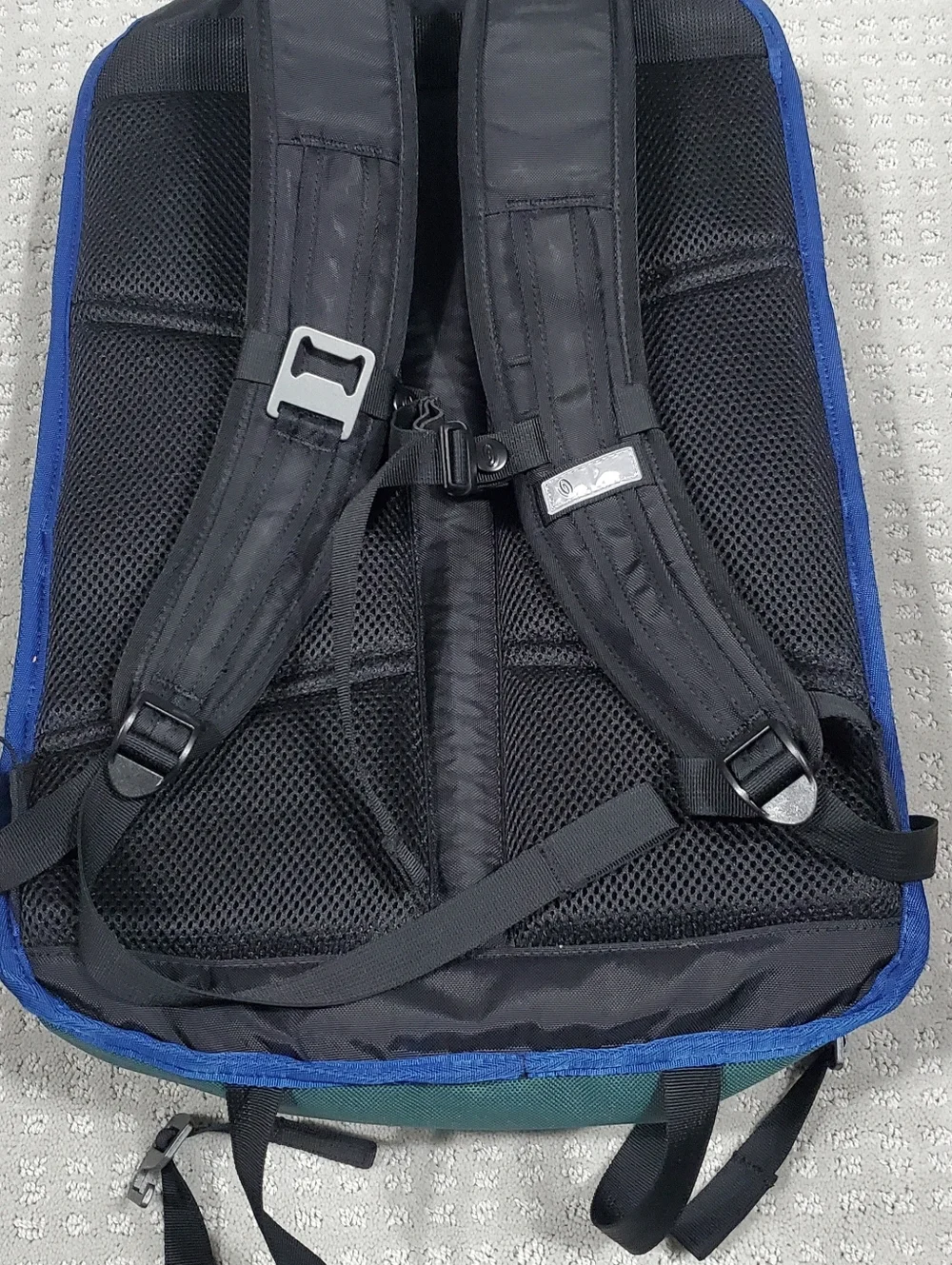 Timbuk2 Alcatraz Laptop Backpack, featuring branding from 23andMe and Lemonade